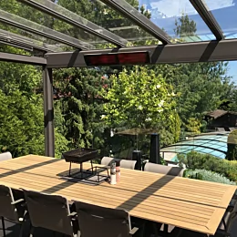 Heatscope Vision 3200W Radiant Heater trims a private residence patio ceiling, delivering silent infrared patio heating performance.